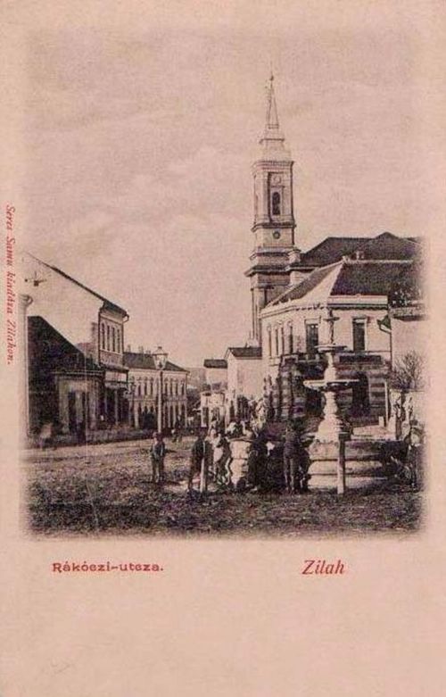 Zilah:Rákóczi utca,kút,templom.1903